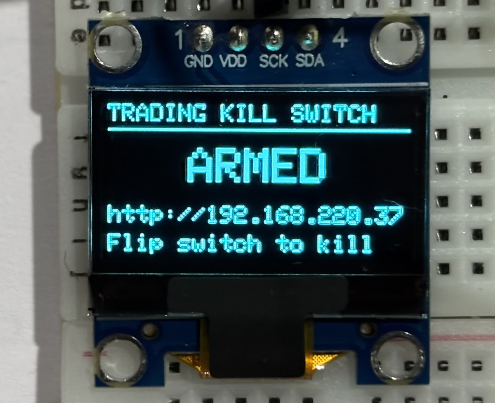 OLED display showing ARMED